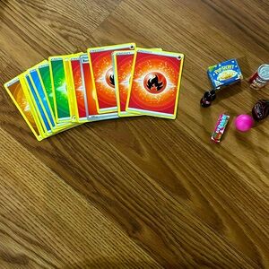 Mini brands one soda one chunky can and popcorn ,multiple energy Pokémon cards
